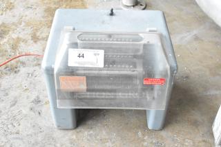 Metal commercial countertop electric meat tenderizer, 115 volts, 1 phase, used condition, safety warning labels visible.