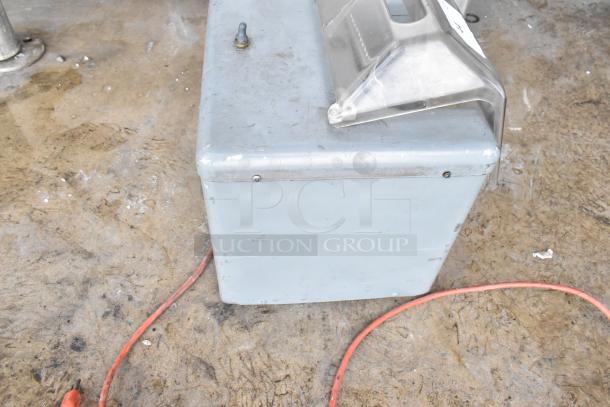 Metal commercial countertop electric meat tenderizer, 115 volts, 1 phase, used condition with visible wear.