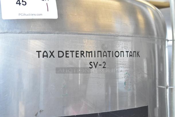 Stainless steel SV-2 tax determination tank for beer, 8.75 BBL capacity, in good condition. Visible label reads "Tax Determination Tank SV-2."