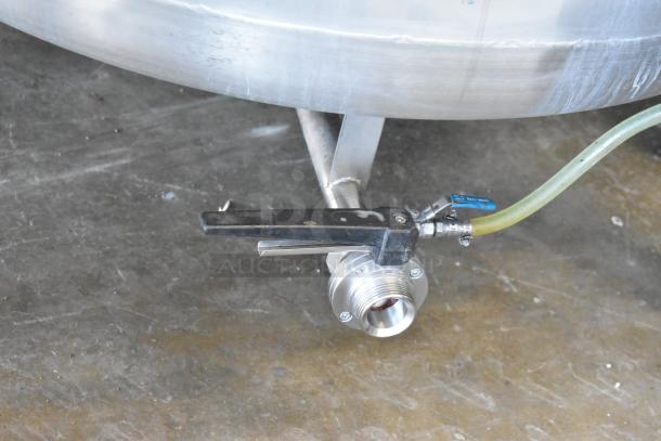 Stainless steel beer tax determination tank, model SV-2, with visible valve and hose attachment. Appears in good condition.