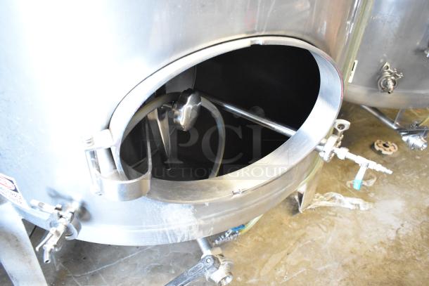 Stainless steel commercial 8.75 BBL beer tank, model SV-2, open hatch, visible valves, and clean interior.