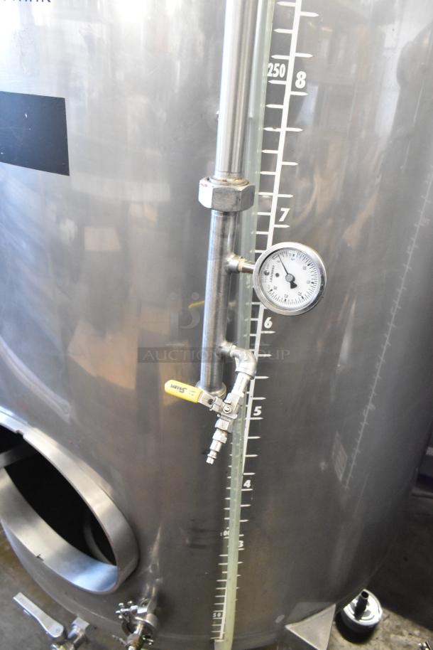 Stainless steel 367-gallon beer tax determination tank with gauge and graduated markings, in excellent condition.