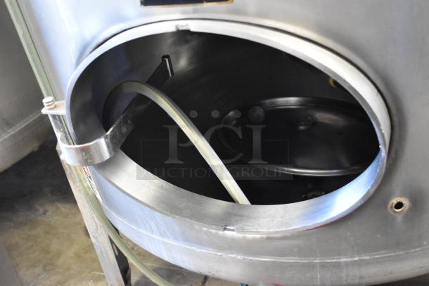 Stainless steel commercial 8.75 BBL/367 gallon clear beer tank, floor style. Visible open lid, hose inlet. Good condition.