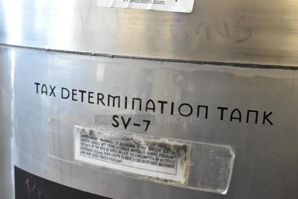 Stainless Steel 8.75 BBL Beer Tax Determination Tank, marked "SV-7," features warning label, commercial-grade condition.