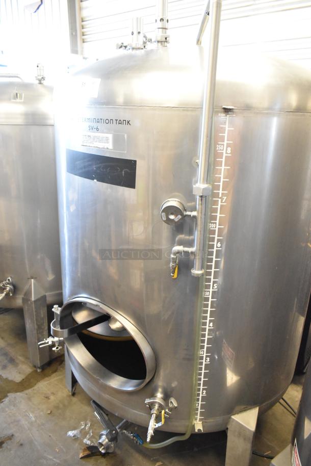 Stainless steel 8.75 BBL / 367-gallon commercial beer tax determination tank with clear level gauge and valve fittings.