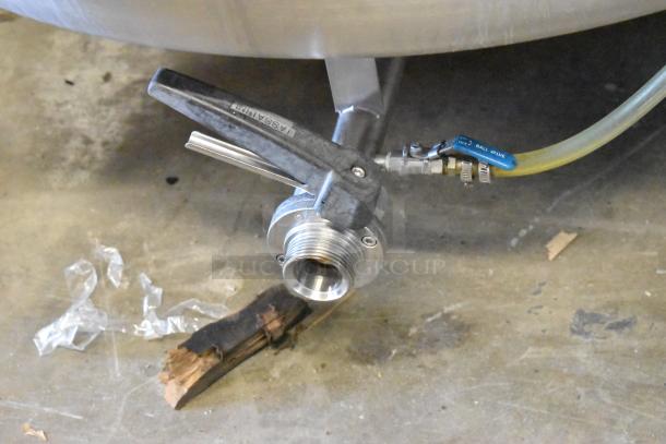 Stainless steel valve of an 8.75 BBL/367 gallon commercial clear beer tank, featuring a ball valve and hose connection.