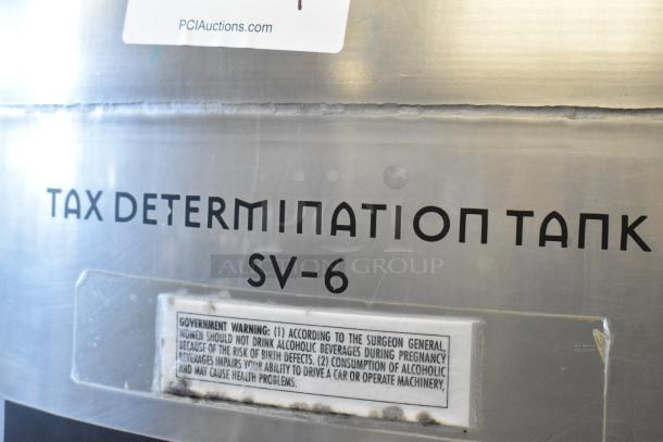 Stainless steel 8.75 BBL/367 gallon beer tax determination tank with “SV-6” marking. Features government warning label.