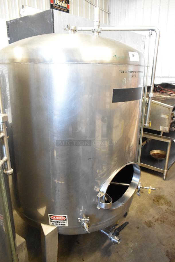 Stainless steel 8.75 BBL beer tax determination tank in good condition with visible markings.
