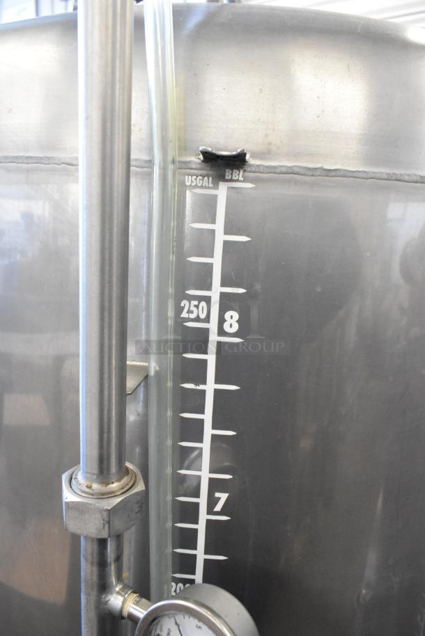Stainless steel 8.75 BBL beer tax determination tank showing capacity gauge and pressure valve. In good condition.