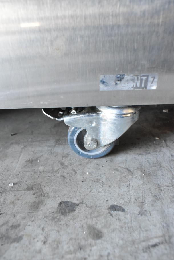 2024 Jun-Air 86R-3MN1-DSBHH stainless steel nitrogen generator, commercial casters, "NT 7" marking visible.