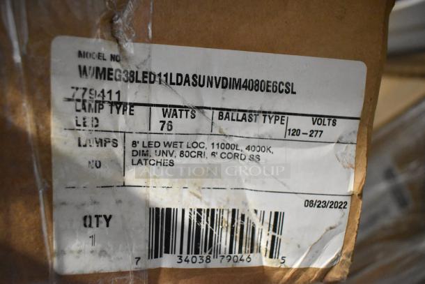 Cardboard box with label showing model W/MEG38LED11LDASUNVDIM, LED lamp type, 76 watts, 8' LED wet location, 4000K, 11000 lumens, dated 06/23/2022.