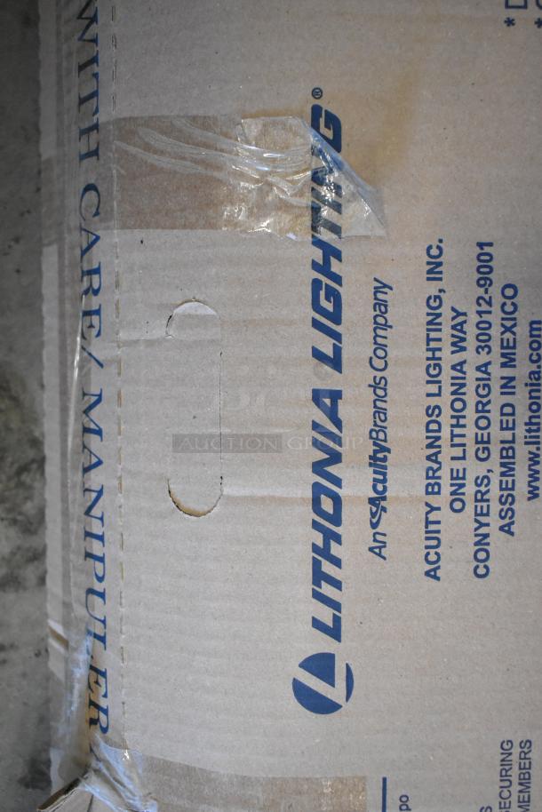 Cardboard box with Lithonia Lighting branding, contains 7 various light fixtures including GTL 4 40L GZ10 LP840 model.