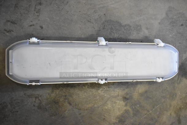 7 light fixtures, including Lithonia Lighting GTL 4 40L GZ10 LP840. White plastic cover, good condition.