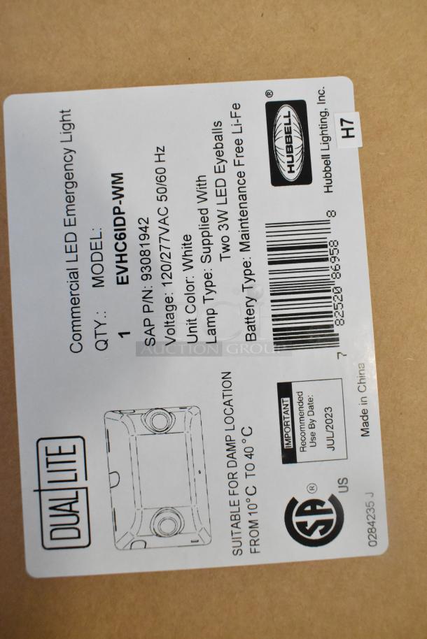 Label of Dual Lite EVHC6IDP-WM LED light box. Includes model, SAP number, voltage, battery type, and use by date.