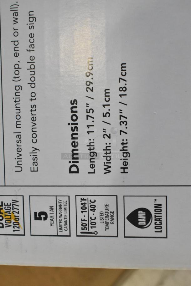 Box showing dimensions and specs for emergency lights: 11.75"x2"x7.37", 120/277V, 5-year warranty, damp location use.
