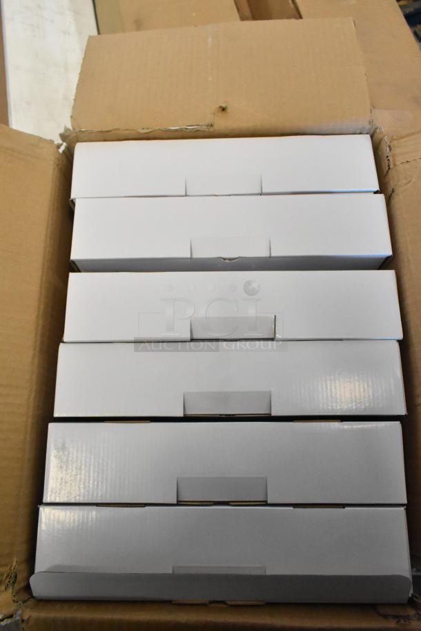 Box of 6 brand new exit signs, minor box damage visible, unopened packages, ideal for emergency signage needs.