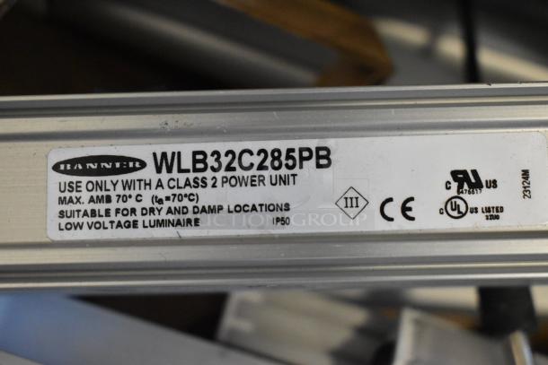 BANNER WLB32C285PB fluorescent lights, new, label shows specs for class 2 power, suitable for dry/damp, IP50 rating.