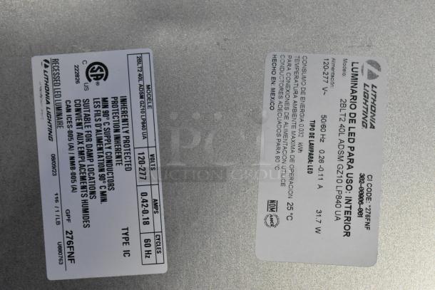 Two new boxes of fluorescent lights, includes Banner WBL32C285PB. Items are labeled "scratch and dent."