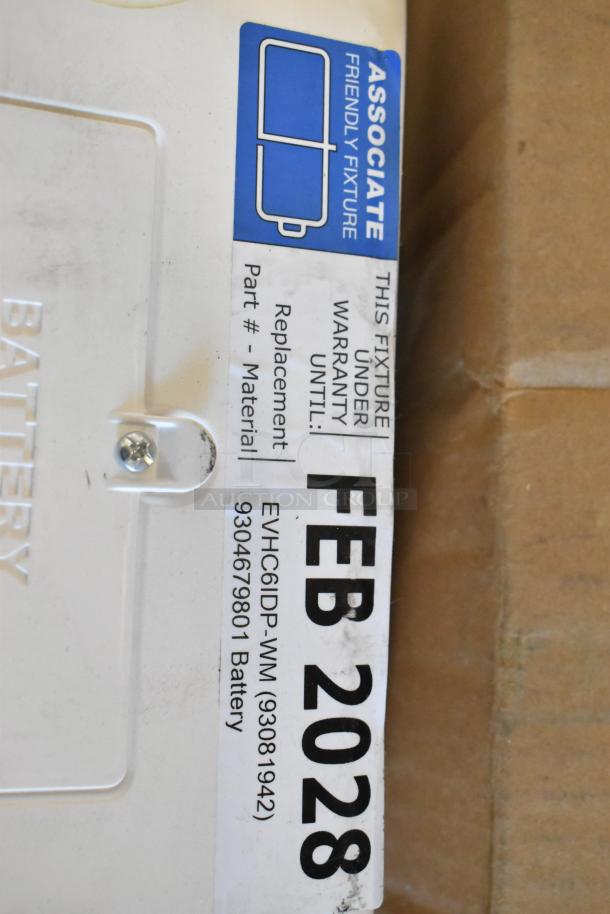 5 new scratch and dent boxes, including Dual Lite emergency light. Warranty label shows expiration February 2028. Part #: EVHC6IDP-WM.