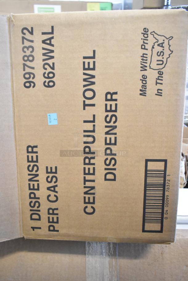 Cardboard box labeled "Center Pull Towel Dispenser," model 9978372, new condition, made in USA, 1 dispenser per case.