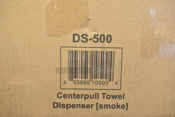 Cardboard box with model DS-500 and barcode showing. Contains Centerpull Towel Dispenser [smoke]. Brand new, scratch and dent.