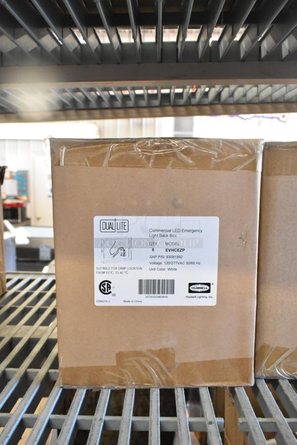 Seven Dual Lite LED Emergency Light Back Box in original packaging, model EVHCEZP. Suitable for damp locations, white color.