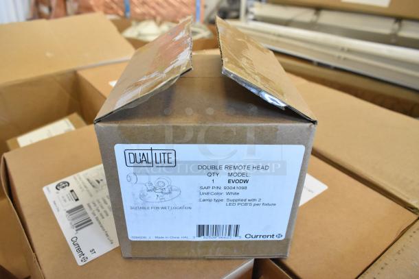 Brown box labeled Dual Lite Double Remote Head, model EVODW, suitable for wet locations. Brand new condition.