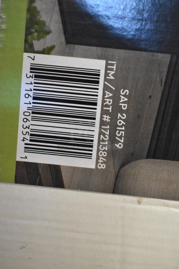 Barcode and item code for a brand new Keter 170G Deck Box, labeled "SCRATCH AND DENT."