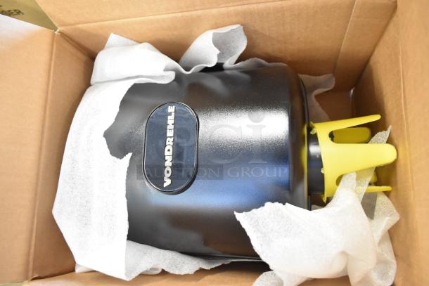 Brand new center pull towel dispenser, Vondrehle, in box with protective packaging, labeled, includes 23 items.