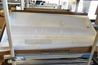 Lithonia Lighting 2BLT4 40L ADSM GZ10 LP840 UA Troffer, new condition, in box labeled "Handle with Care."