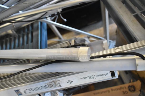 Mixed lot of 30 items including fluorescent tube lights, assorted condition. Visible label: Z Systems.