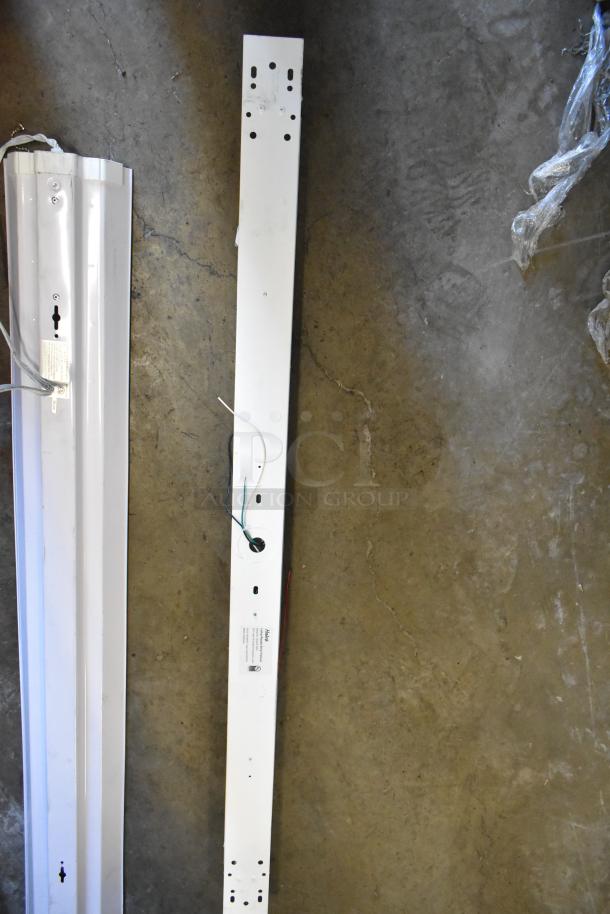 7 light fixtures, mixed styles, metal frames, various conditions. Some wiring visible. Labels: installation details.