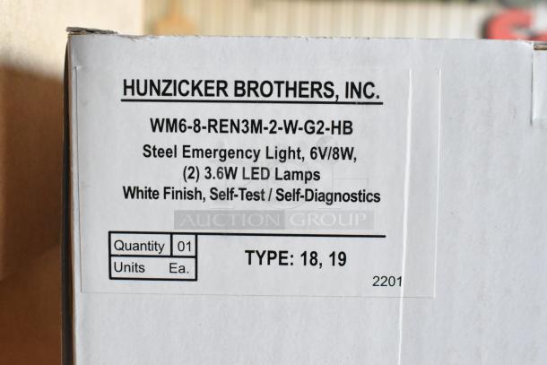 Box with label reading “Hunzicker Brothers, Inc.” featuring WM6-8-REN3M-2-W-G2-HB, steel emergency light, 6V/8W, white finish.