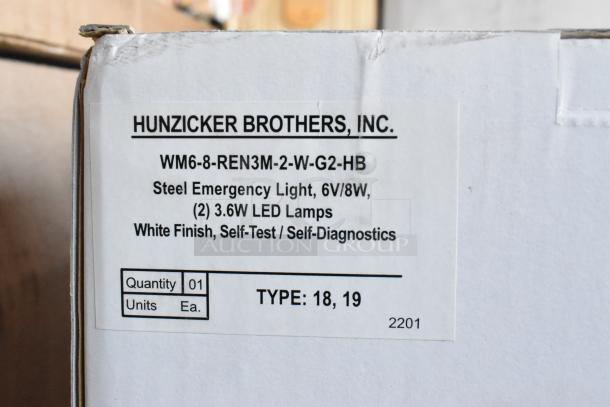 Hunzicker Brothers emergency light model WM6-8-REN3M-2-W-G2-HB, 6V/8W, 3.6W LED, white finish, self-test feature.