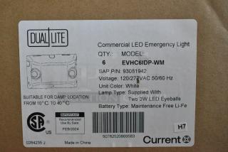 Box of 6 Dual Lite EVHC6IDP-WM LED emergency lights, brand new with minor scratches; includes two 3W LED eyeballs.