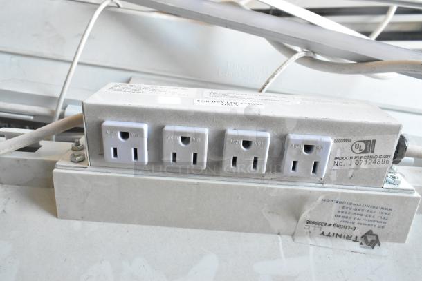 8 light fixtures; includes 4 socket outlets. "Trinity" branding, UL listed, indoor use. Model J07124896 noted.