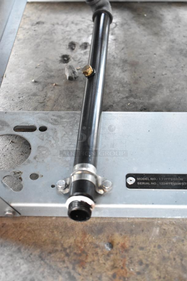 Avantco 177FFES50N stainless steel natural gas deep fat fryer, 85,000 BTU, with scratches and dents. Model plate visible.