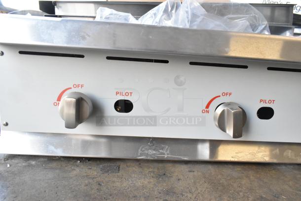 BRAND NEW Cooking Performance Group stainless steel charbroiler grill, model 351CRCPG48NL, 160,000 BTU, natural gas powered.