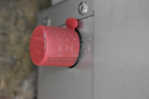 Red control knob on Cooking Performance Group 351CRCPG48NL charbroiler grill. Stainless steel finish, brand new condition.