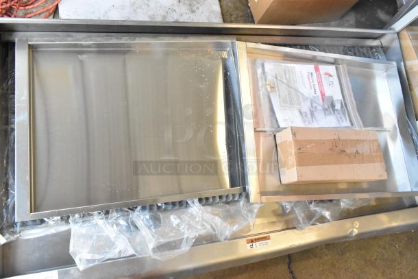 Brand new Cooking Performance Group 351CRCPG48NL stainless steel charbroiler grill, 160,000 BTU, with visible packaging and documents.