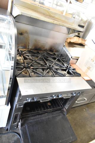 Southbend Stainless Steel Commercial Gas Powered 6 Burner Range w/ Oven and Back Splash. - Item #1226612