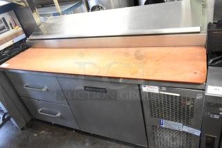 Delfield Stainless Steel Commercial Pizza Prep Table. 115 Volts, 1 Phase. Tested and Powers On But Does Not Get Cold - Item #1226613