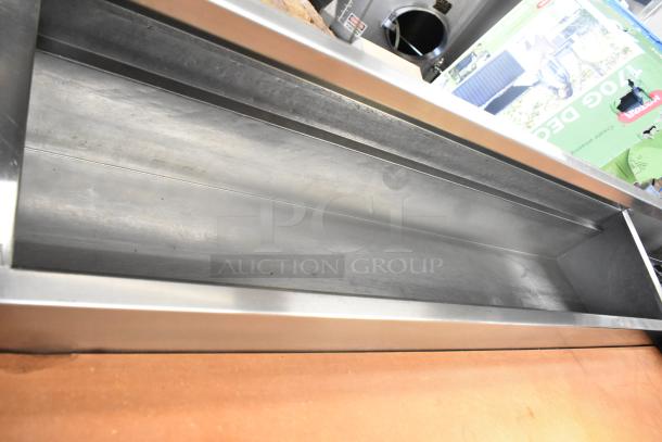 Delfield stainless steel commercial pizza prep table, 115 volts, 1 phase, interior view, clean condition.