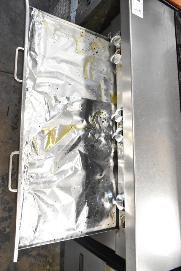 Southbend P36G-BBB stainless steel 6 burner range with oven, natural gas, commercial use, visible grease, moderate wear.