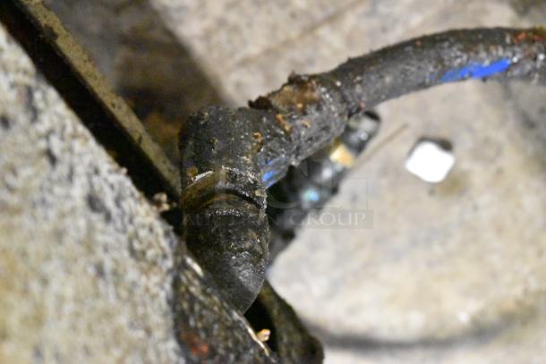 Pitco Frialator steel deep fat fryer with visible wear and rust on pipe. Ideal for commercial use.