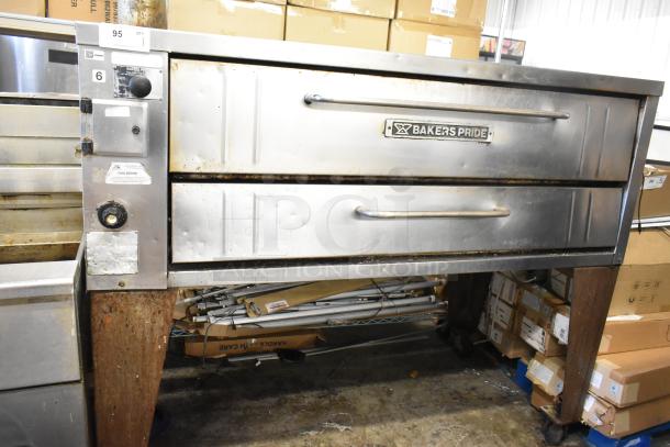 Bakers Pride 4151 stainless steel single deck pizza oven on legs, natural gas powered, 70,000 BTU, used condition.