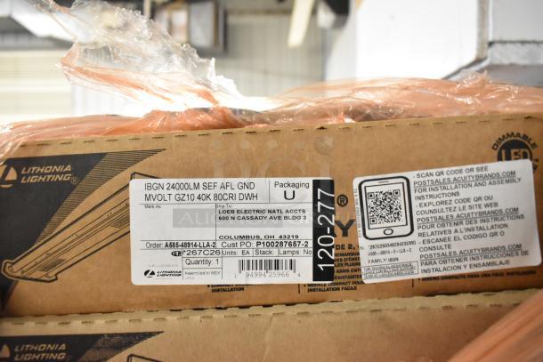 Box of Lithonia Lighting I Beam LED fixtures, model IBGN 24000LM, 40K 80CRI DWH, in original packaging with labels.