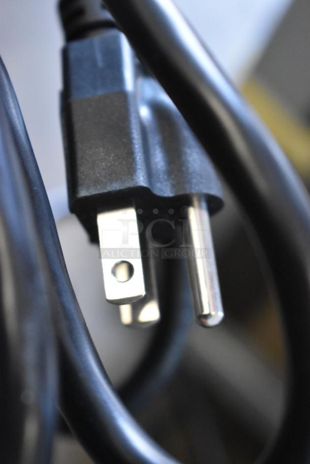 Close-up of a power plug for the Carnival King 382PM1360 commercial popcorn machine.