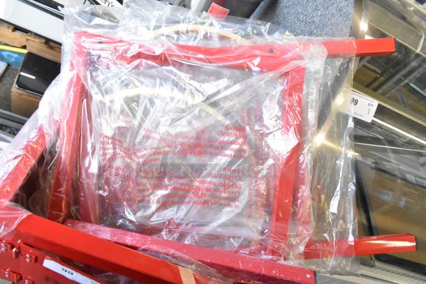 Brand new Carnival King 382PM1360 popcorn machine, 12 oz., metal construction, in original packaging with minor scratches.