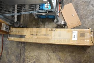 BRAND NEW SCRATCH AND DENT! Lancaster Table & Seating bar height rustic walnut finish wooden table base in original packaging.